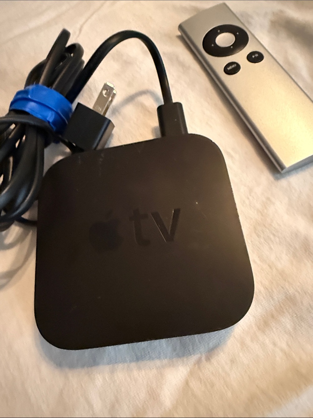 Apple 2nd gen TV Media Streamer - Black with Silver Remote. A1378
